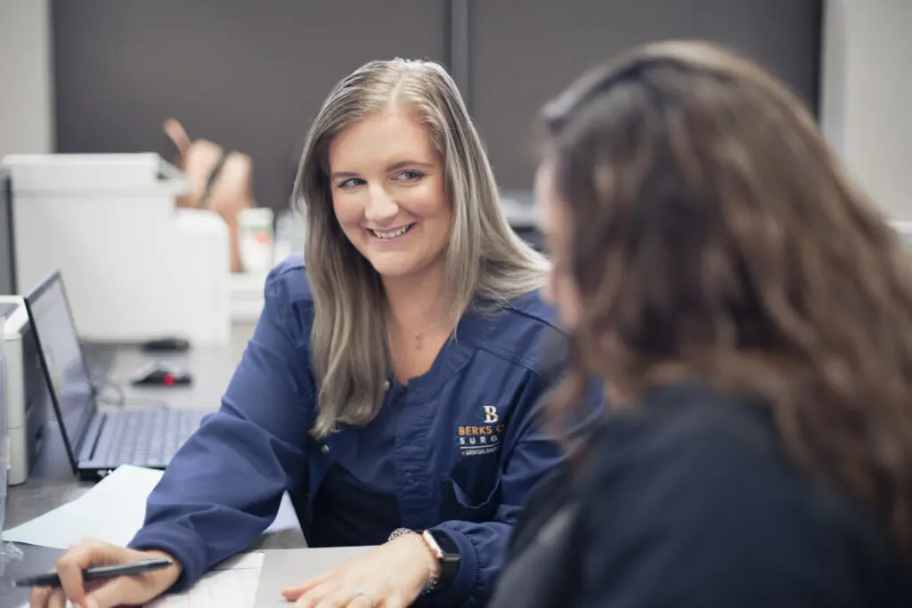 Staff working on papers