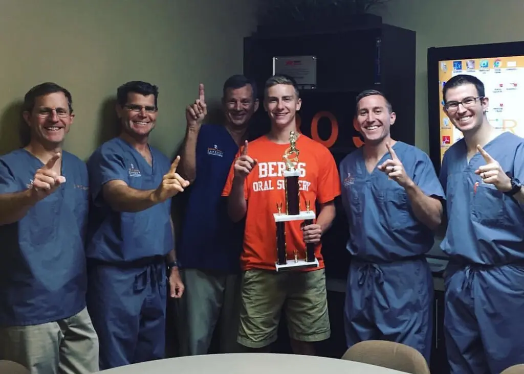 doctors and patient group photo